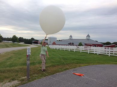 margaret releases the balloon