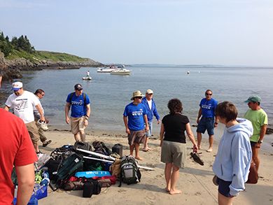 unloading our gear on the beach