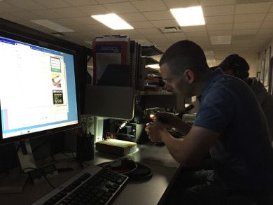 Ryan and Thom work on the SKYWARN station