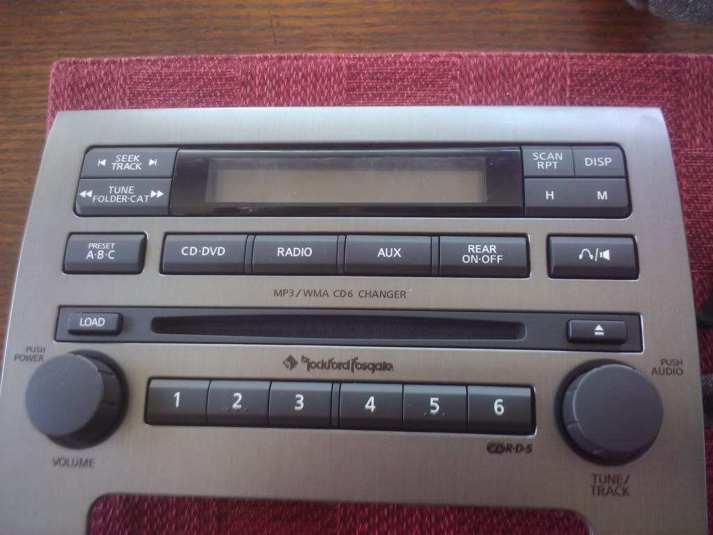 **F/S** Rockford Fosgate 6 disc changer!! - Nissan Titan Forum